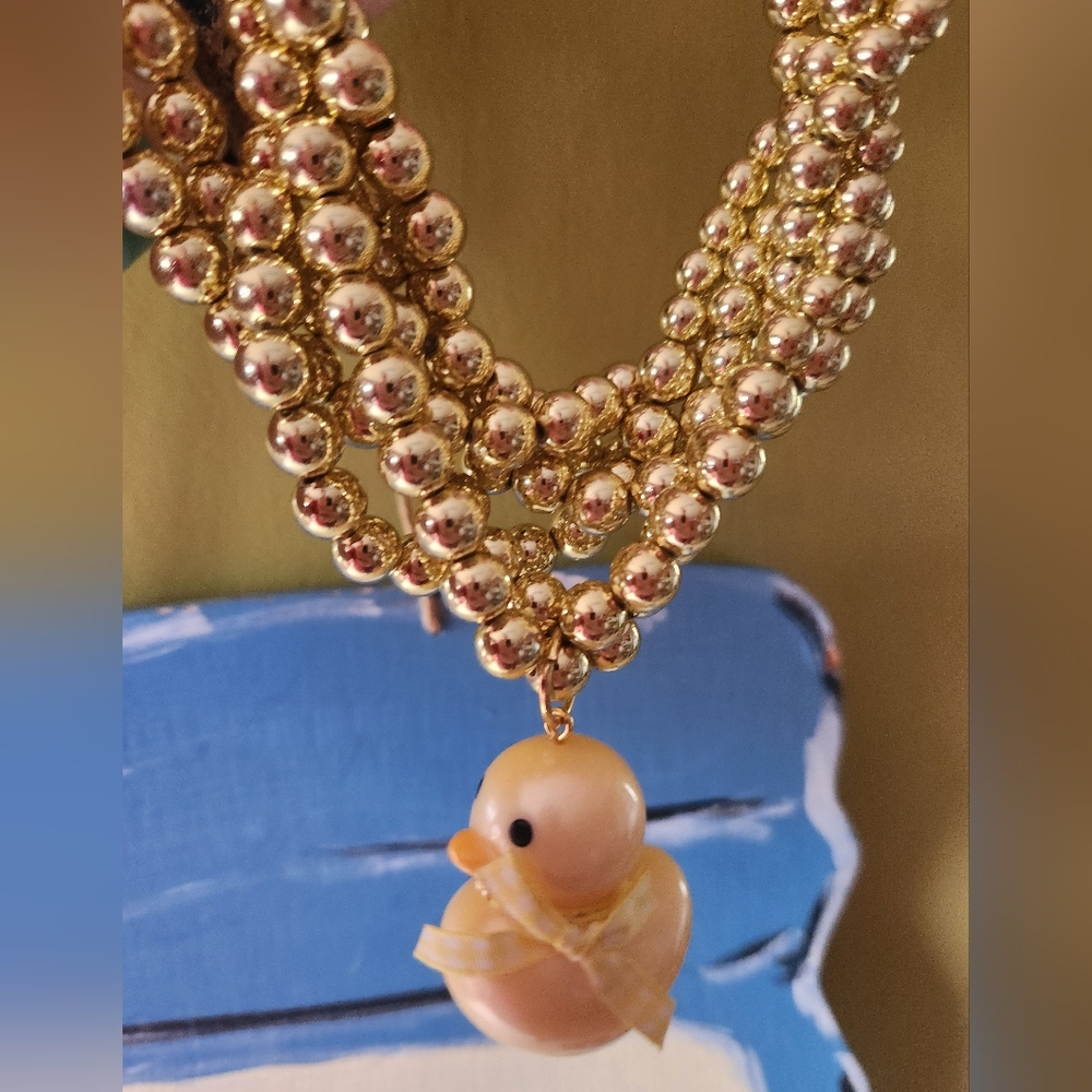 Gold Beaded Necklace with Duck Pendant